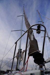 Low angle view of people against sky