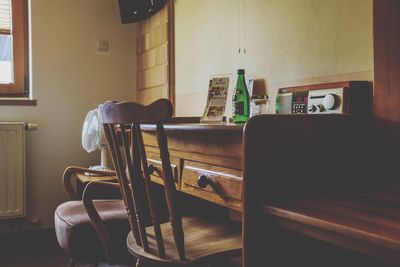 Close-up of chair on table at home