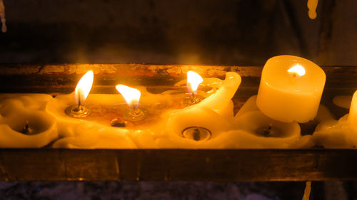 Close-up of lit candle