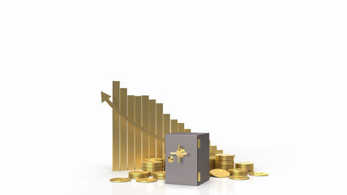 Close-up of coin stack against white background
