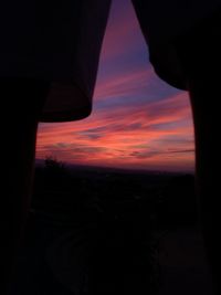 Silhouette landscape against sky during sunset