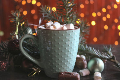 Close-up of coffee cup on table