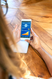 Man using mobile phone on table