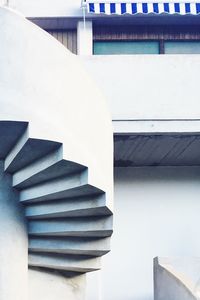 Close-up of stack of building against sky