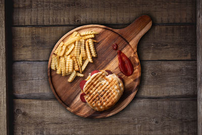 High angle view of bread on cutting board