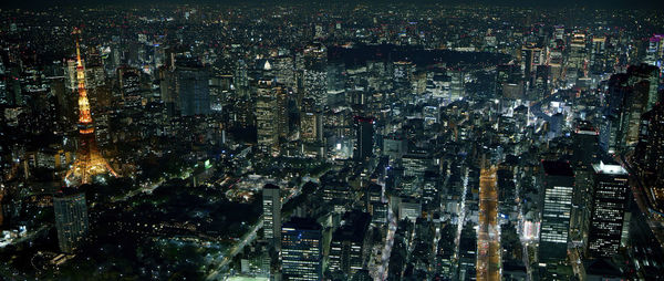 High angle view of illuminated modern buildings in city at night, tokyo-japan