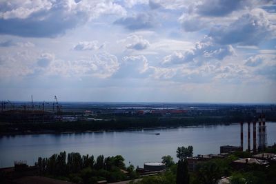 Scenic view of sea against cloudy sky