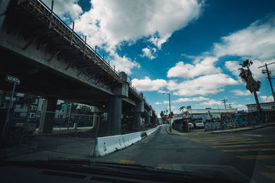 Road in city against sky