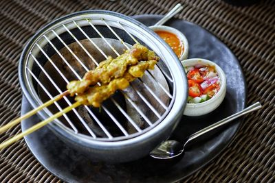 High angle view of meat in cooking pan