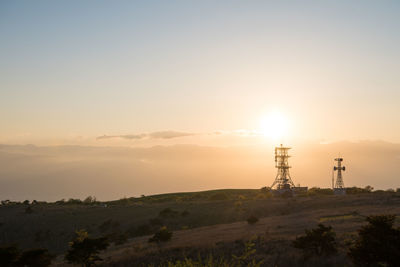 Scenic view of landscape against sky during sunset