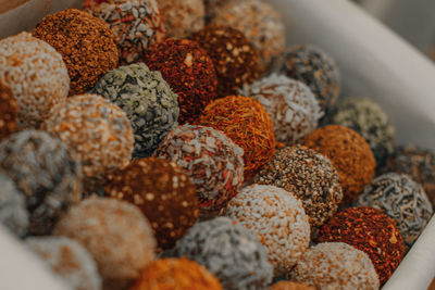 Assorted handmade truffle chocolates candies made from organic ingredients. raw food diet concept.