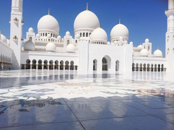 Exterior of sheikh zayed mosque against clear blue sky in city