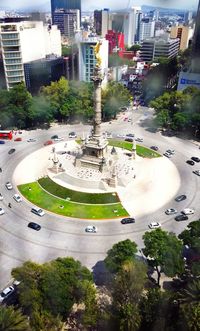 High angle view of street amidst buildings in city