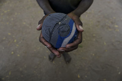 High angle view of man holding hands