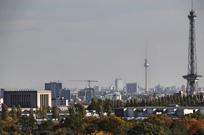 Modern buildings in city against sky