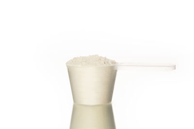 Close-up of drink against white background