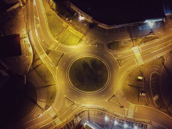 High angle view of illuminated street at night