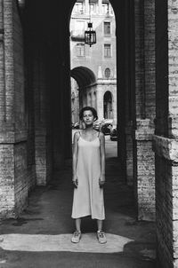 Rear view of people walking in temple