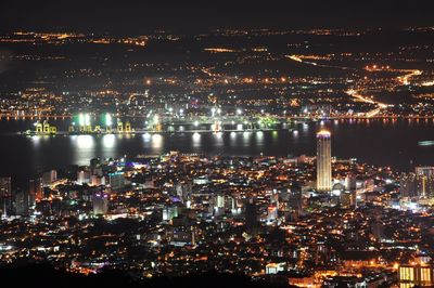 Illuminated cityscape at night