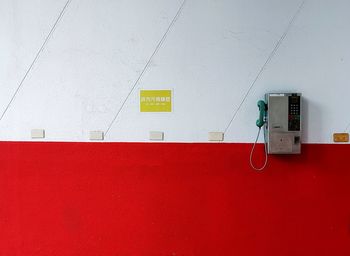 Pay phone on the wall