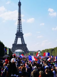 Group of people in front of tower