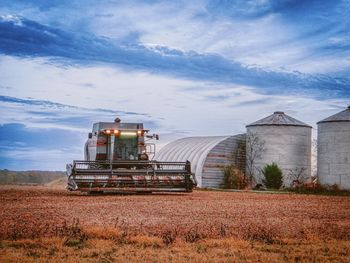 International harvester grain silos harvesting field of wheat