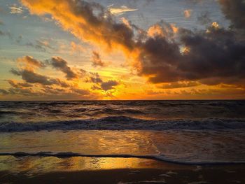 Scenic view of sea at sunset