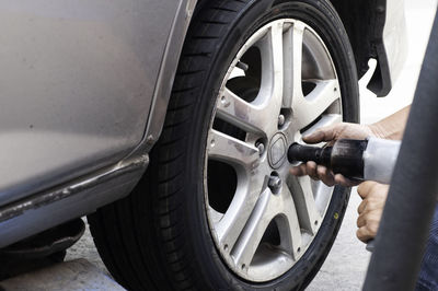 Close-up of a hand holding car