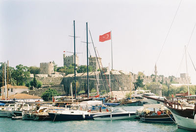 Boats sailing in harbor