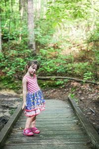 Full length of woman in forest