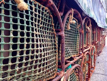 Close-up of rusty metal against sky