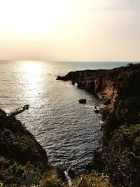 Scenic view of sea against sky during sunset