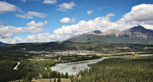 Scenic view of mountains against cloudy sky