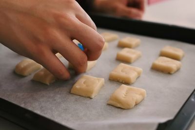 Close-up of person preparing food
