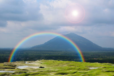 Scenic view of rainbow against sky