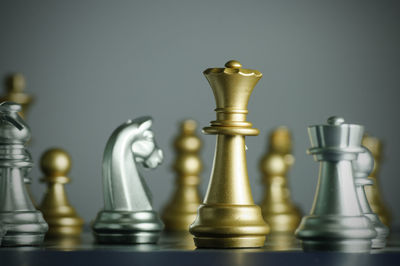 Close-up of chess board against gray background