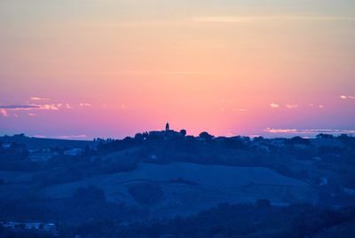 Scenic view of silhouette landscape against sky during sunset