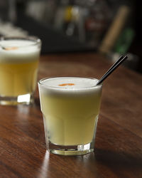 Close-up of drink in glasses on table