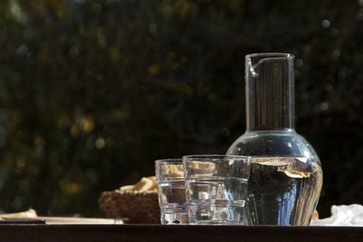 Close-up of water bottle in glass