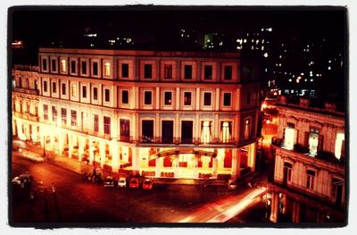 View of illuminated buildings at night