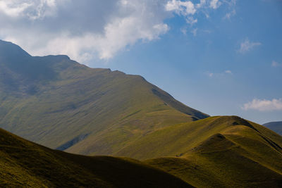 Scenic view of mountains against cloudy sky in montefortino, marche italy