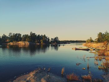 Scenic view of lake against clear sky