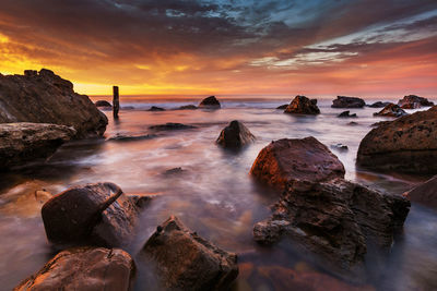 Scenic view of sea against sky during sunset