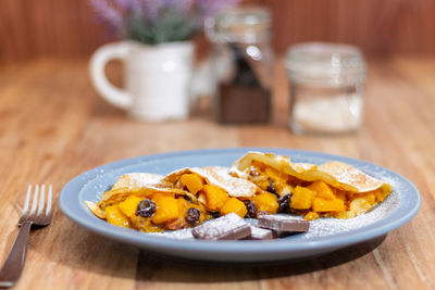 Close-up of breakfast served on table