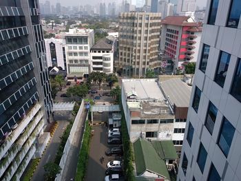 High angle view of street amidst buildings in city