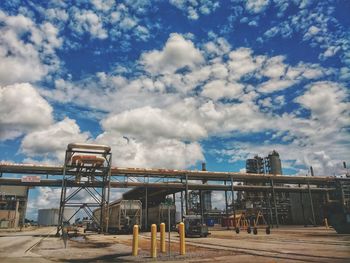 Low angle view of construction site against sky