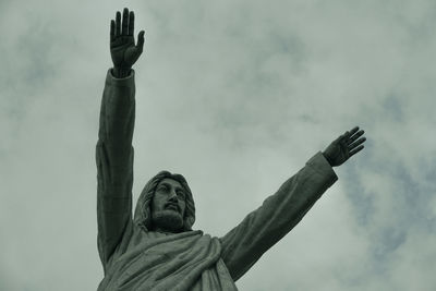 Low angle view of statue against sky