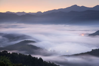 Scenic view of mountains against sky during sunset