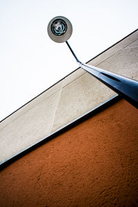 Low angle view of clock tower against sky