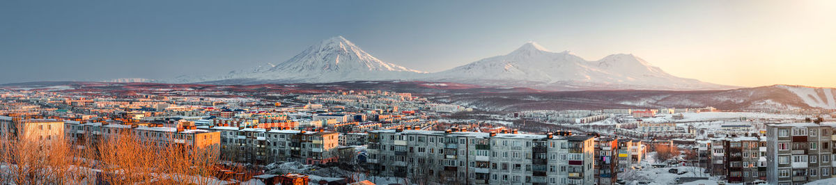 Panoramic shot of cityscape against sky